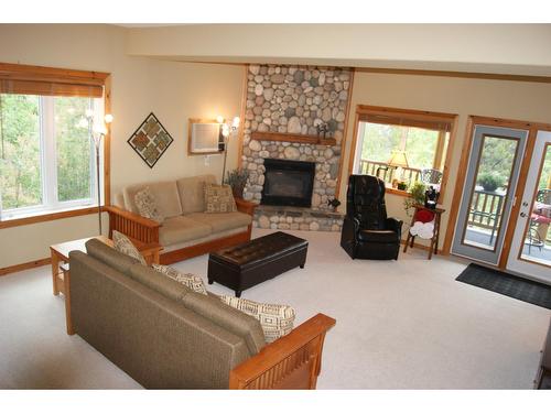 201 - 890 Dogwood Drive, Kimberley, BC - Indoor Photo Showing Living Room With Fireplace