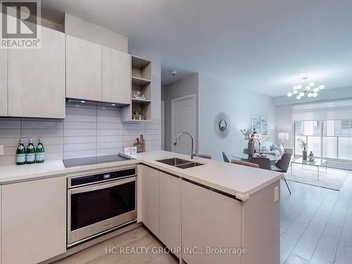 711 - 398 Highway 7 E, Richmond Hill, ON - Indoor Photo Showing Kitchen With Double Sink With Upgraded Kitchen
