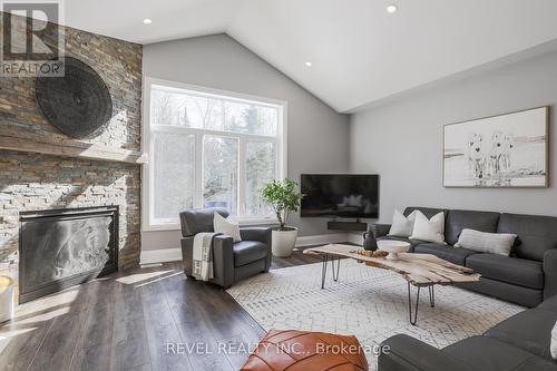 99 Kagawong Road, Kawartha Lakes, ON - Indoor Photo Showing Living Room With Fireplace