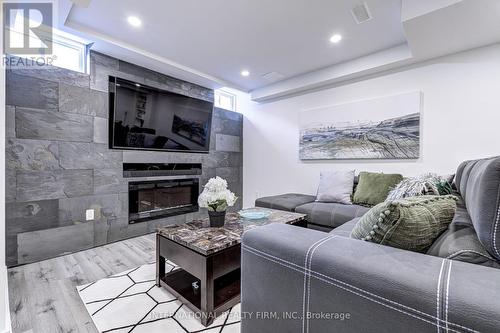 19 Ledgerpoint Crescent, Brampton, ON - Indoor Photo Showing Living Room With Fireplace