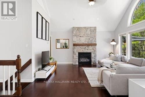 1078 Buckeye Road, Muskoka Lakes, ON - Indoor Photo Showing Living Room With Fireplace
