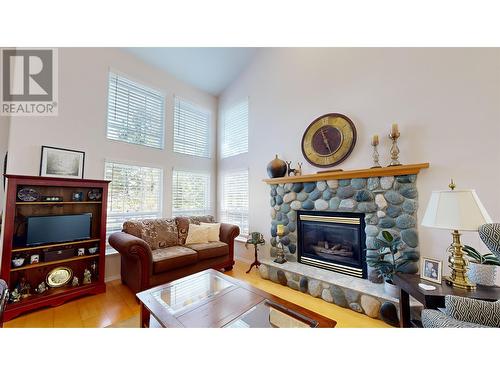 4848 Kitwanga Drive, 108 Mile Ranch, BC - Indoor Photo Showing Living Room With Fireplace