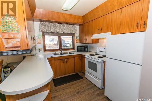 203 Bayne Street, Luseland, SK - Indoor Photo Showing Kitchen With Double Sink