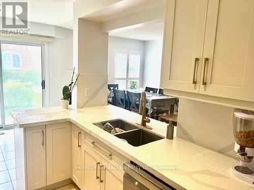 112 - 5230 Glen Erin Drive, Mississauga, ON - Indoor Photo Showing Kitchen With Double Sink
