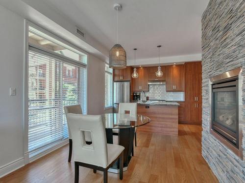 Dining room - 2800 Rue Des Francs-Bourgeois, Boisbriand, QC - Indoor Photo Showing Kitchen With Fireplace