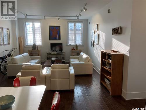 202 1839 Scarth Street, Regina, SK - Indoor Photo Showing Living Room With Fireplace
