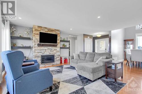 2968 Drew Drive, South Mountain, ON - Indoor Photo Showing Living Room With Fireplace