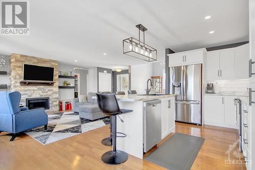 2968 Drew Drive, South Mountain, ON - Indoor Photo Showing Kitchen With Fireplace With Upgraded Kitchen