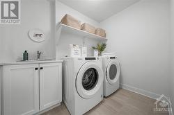2nd Level Laundry. Photos are of similiar floorplan and may include upgrades/finishes not included in standard model. - 