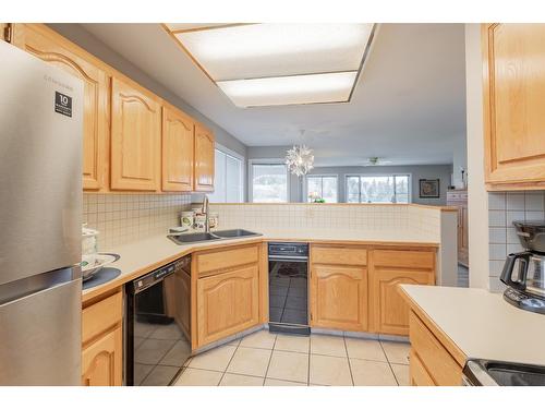 13 - 5054 Riverview Road, Fairmont Hot Springs, BC - Indoor Photo Showing Kitchen With Double Sink