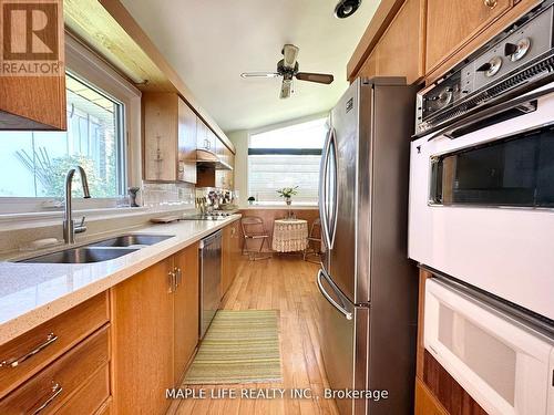 91 Citation Drive, Toronto, ON - Indoor Photo Showing Kitchen With Double Sink