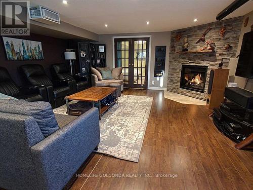Basemen - 2341 Taylorwoods Boulevard, Innisfil, ON - Indoor Photo Showing Living Room With Fireplace
