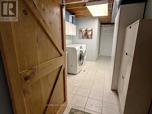 Basemen - 2341 Taylorwoods Boulevard, Innisfil, ON - Indoor Photo Showing Laundry Room