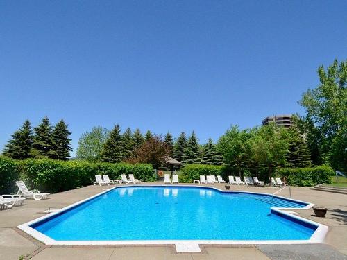 Piscine - 411-201 Ch. Du Club-Marin, Montréal (Verdun/Île-Des-Soeurs), QC - Outdoor With In Ground Pool With Backyard