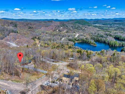 Photo aÃ©rienne - 309 Ch. Des Grands, La Conception, QC - Outdoor With Body Of Water With View