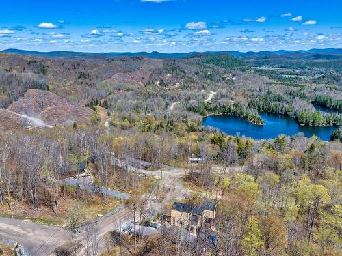Overall view - 309 Ch. Des Grands, La Conception, QC - Outdoor With Body Of Water With View