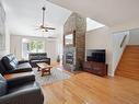 Salon - 201-475 Boul. Perrot, L'Île-Perrot, QC  - Indoor Photo Showing Living Room With Fireplace 