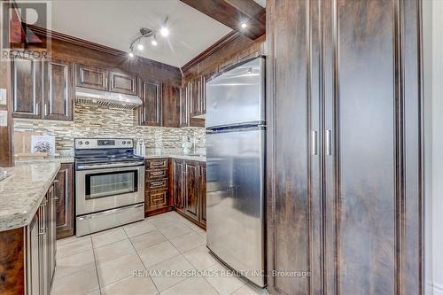603 - 5580 Sheppard Avenue E, Toronto, ON - Indoor Photo Showing Kitchen With Upgraded Kitchen