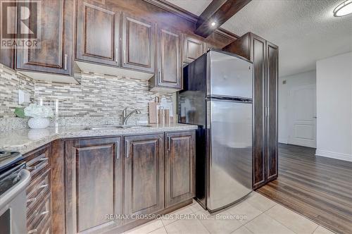603 - 5580 Sheppard Avenue E, Toronto, ON - Indoor Photo Showing Kitchen With Upgraded Kitchen