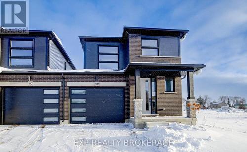 102 Thackeray Way, Minto, ON - Outdoor With Facade