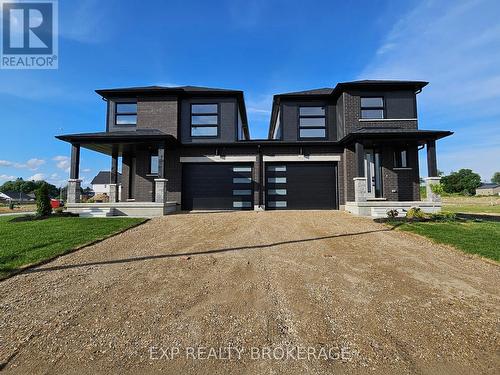 102 Thackeray Way, Minto, ON - Outdoor With Facade