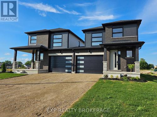 102 Thackeray Way, Minto, ON - Outdoor With Facade