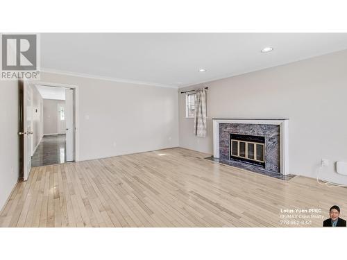 7688 Cartier Street, Vancouver, BC - Indoor Photo Showing Living Room With Fireplace