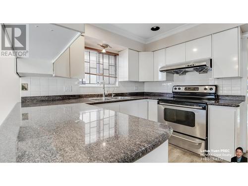 7688 Cartier Street, Vancouver, BC - Indoor Photo Showing Kitchen With Double Sink