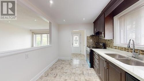 57 Habitant Drive, Toronto, ON - Indoor Photo Showing Kitchen With Double Sink