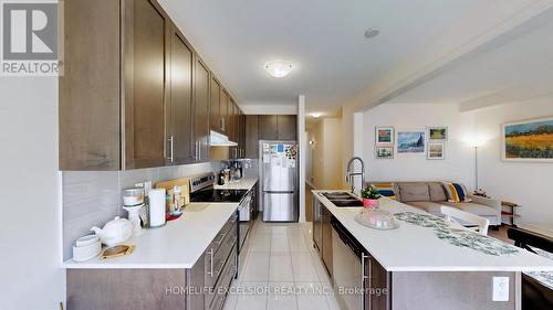 101 Cobriza Crescent, Brampton, ON - Indoor Photo Showing Kitchen With Stainless Steel Kitchen With Double Sink With Upgraded Kitchen