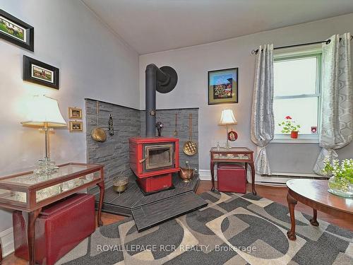 2964 12/13 Sunnidale Sdrd S, Clearview, ON - Indoor With Fireplace