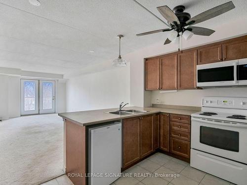 305-486 Laclie St, Orillia, ON - Indoor Photo Showing Kitchen With Double Sink