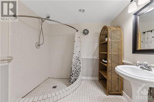 Large bathroom on the lower level with a shower for 2! - 2403 Iris Street, Ottawa, ON - Indoor Photo Showing Bathroom