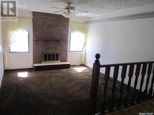 703 Golburn Crescent, Tisdale, SK - Indoor With Fireplace