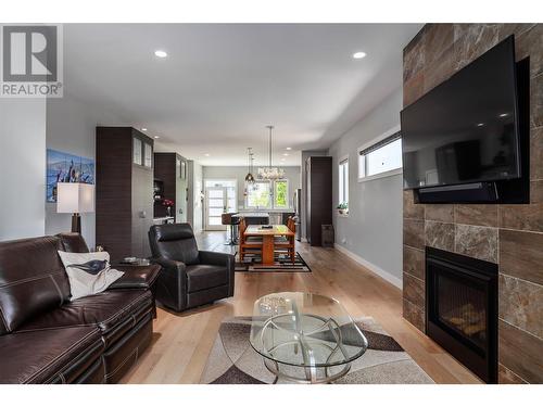 409 Dunbar Court, Kelowna, BC - Indoor Photo Showing Living Room With Fireplace