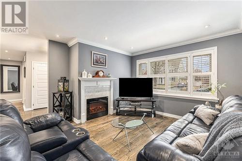 357 Huron Avenue S, Ottawa, ON - Indoor Photo Showing Living Room With Fireplace