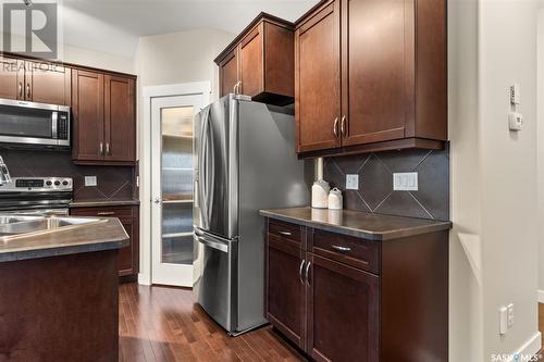153 Poplar Bluff Crescent, Regina, SK - Indoor Photo Showing Kitchen With Stainless Steel Kitchen With Double Sink