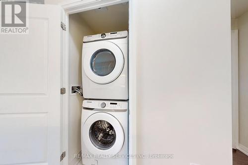 618 - 50 Thomas Riley Road, Toronto W08, ON - Indoor Photo Showing Laundry Room