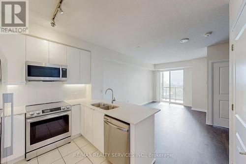 618 - 50 Thomas Riley Road, Toronto W08, ON - Indoor Photo Showing Kitchen With Stainless Steel Kitchen With Double Sink