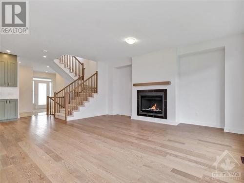 750 Cope Drive, Ottawa, ON - Indoor Photo Showing Living Room With Fireplace