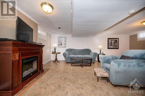 104 Ellis Avenue, Pembroke, ON - Indoor Photo Showing Living Room With Fireplace