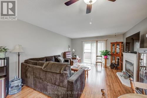 21 Edwin Crescent, Tillsonburg, ON - Indoor Photo Showing Living Room With Fireplace