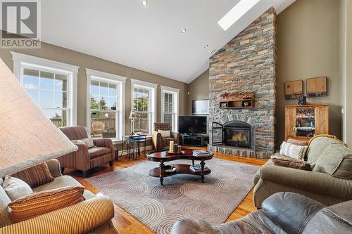 12 Uncle Jim'S Place, Flatrock, NL - Indoor Photo Showing Living Room With Fireplace