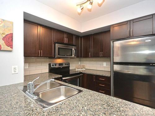 1206-208 Enfield Pl, Mississauga, ON - Indoor Photo Showing Kitchen With Stainless Steel Kitchen With Double Sink
