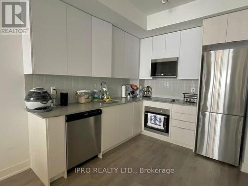 2105 - 297 Oak Walk Drive, Oakville (Uptown Core), ON - Indoor Photo Showing Kitchen With Stainless Steel Kitchen