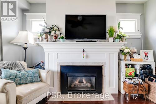 1034 Caven Street N, Mississauga, ON - Indoor Photo Showing Living Room With Fireplace