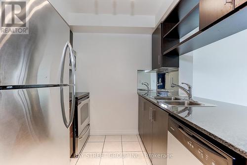 1202 - 30 Herons Hill Way, Toronto, ON - Indoor Photo Showing Kitchen With Double Sink