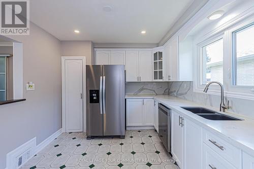 103 Clifton Avenue, Toronto, ON - Indoor Photo Showing Kitchen With Double Sink