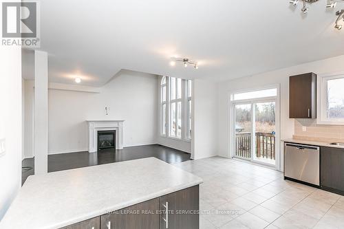 27 Pearl Street, Wasaga Beach, ON - Indoor Photo Showing Kitchen With Fireplace