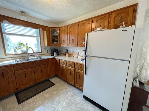 227 Lindsay Street, Mccreary, MB - Indoor Photo Showing Kitchen With Double Sink